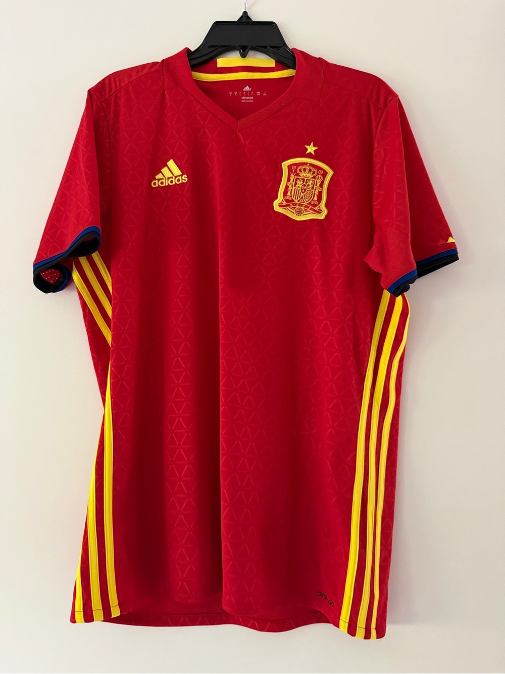 Men’s Adidas Spain home soccer jersey from the 2016-2017 season; large